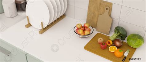 Top view, Modern white kitchen countertop with veggies and fruits ...