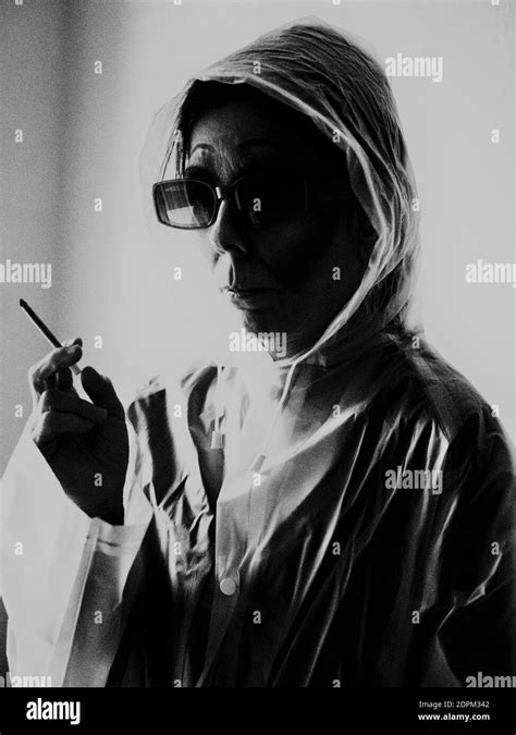 Woman Wearing Raincoat Black And White Stock Photos Images Alamy