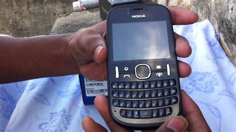 Unboxing Nokia Asha 201 YouTube