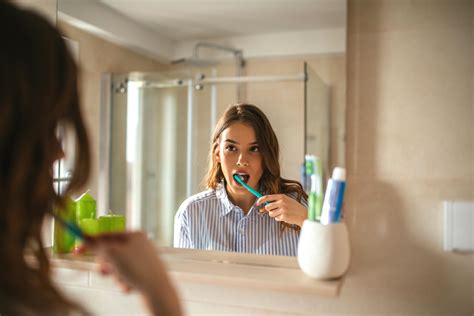 Woman Brushing Teeth