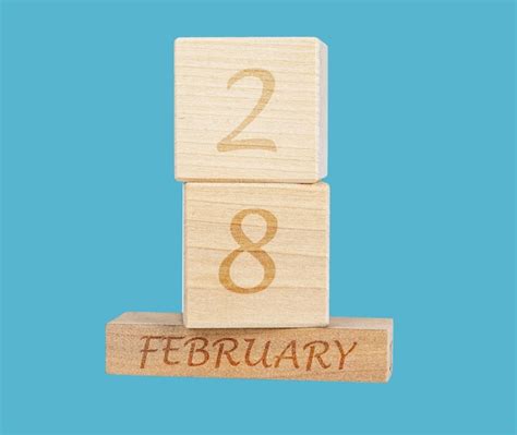 Premium Photo | 28 february day on wood calendar 28th feb