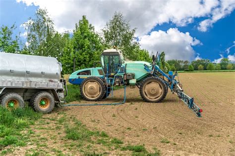 Premium Photo Chemicals Against Weeds Refueled In The Tank Of A