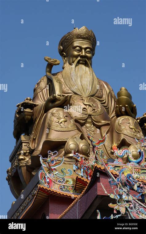 Tu Di Gong statue Stock Photo - Alamy