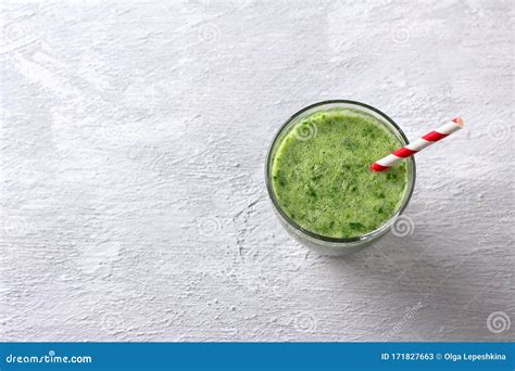 Healthy Breakfast Green Smoothie Of Spinach Parsley And Banana On