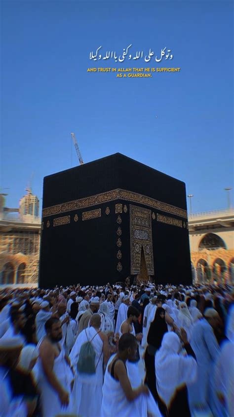 Many People Are Gathered Around The Ka Bah In Front Of An Ornate Building