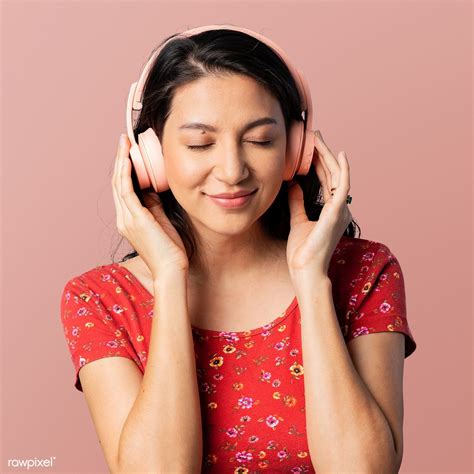 Cheerful Woman Listening To Music With A Headset Mockup Premium Image