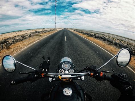 Anonymous Biker Riding Motorcycle On Highway In Countryside · Free