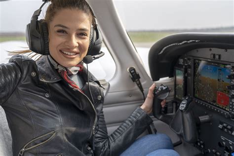 Woman Pilot In Cockpit