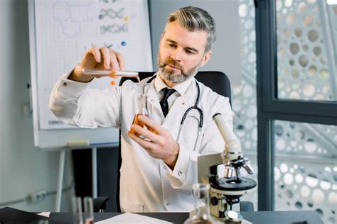 Caucasian Man Virologist Bio Chemist Scientist Wearing White Coat