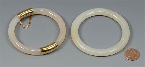 Lot 575: Pair White Jade Bangle Bracelets | Case Auctions