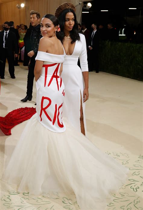 Look Alexandria Ocasio Cortez Wears Statement Dress To 2021 Met Gala