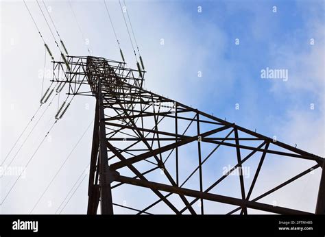 The Silhouette Of The Electricity Transmission Pylon In Daytime