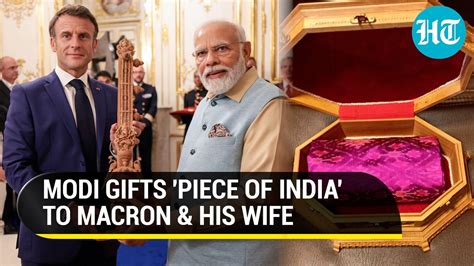 Pm Modi Presents Sitar To Macron Silk To Wife Details Of Unique T