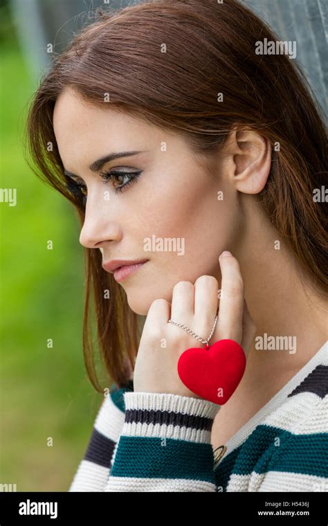 Beautiful Thoughtful Sad Heartbroken Girl Or Young Woman With Red Hair