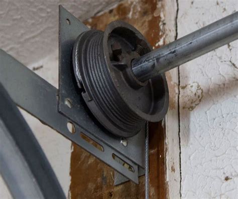 how to fix a broken garage door cable