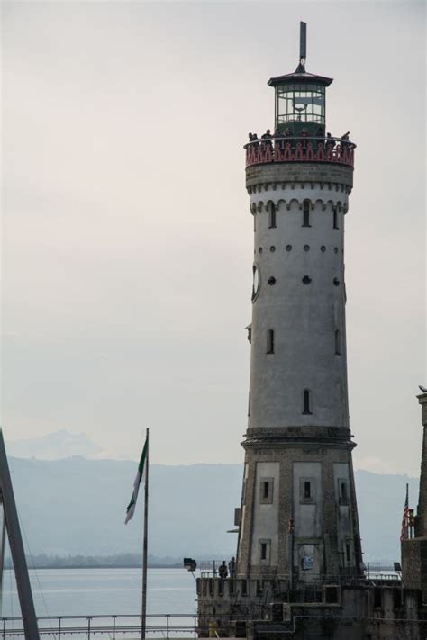 Free Images Sea Coast Water Ocean Lighthouse Reflection Vehicle