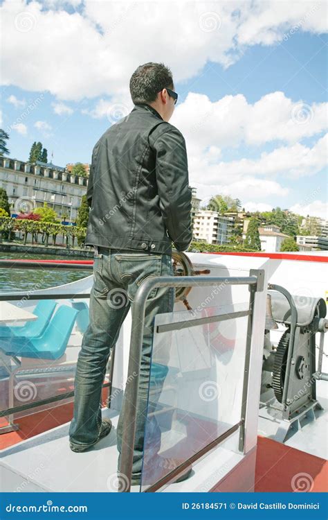 Man Driving A Boat On Beautiful Landscape Stock Image Image Of