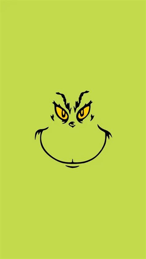 the grin face is drawn on a green background