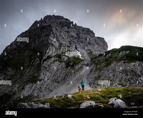 Hiking through the Alps Stock Photo - Alamy