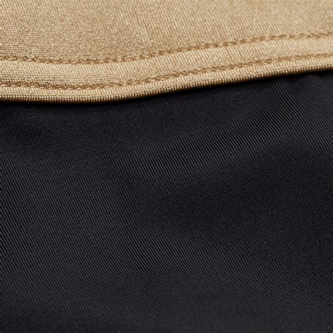 Bikini Hose Surfen Mädchen 900 Buddy schwarz gold Decathlon