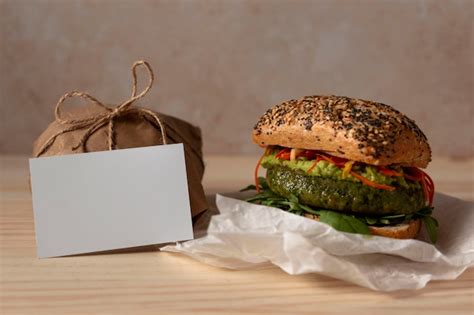 Free Photo | Front view burger with delivery package