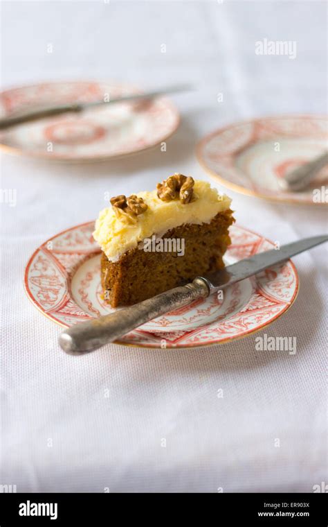 Carrot cake with cream cheese icing Stock Photo - Alamy