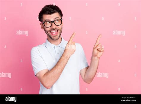 Portrait Photo Of Young Funny Excited Positive Guy Look Pointing Fingers Empty Space Sale