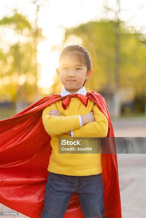 Supergirl Arms Crossed Stock Photo Download Image Now Girl Power