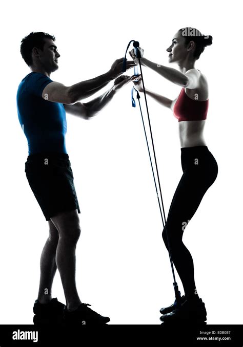 Personal Trainer Man Coach And Woman Exercising Gymstick Silhouette