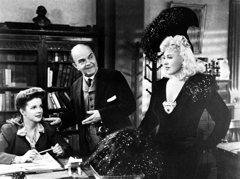 Mae West And Victor Moore Appearing In A Scene From Columbia S “the Heat S On” 1943 Mae West