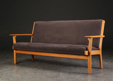 Hans J Wegner Tre pers sofa egetræ Auktionshuset