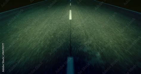 Driving on a Road at night. Seamless Loop Stock Video | Adobe Stock