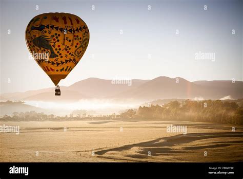 Hot Air Balloon At Sunrise In Australia Stock Photo Alamy