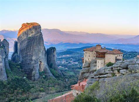 Premium Photo | Monasteries of meteora at sunset greece