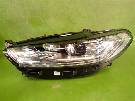 Reflektor lewy lampa przód FORD MONDEO MK5 LIFT ES73 13D155 CD za 559