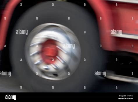 red lorry wheels spinning stock photo alamy