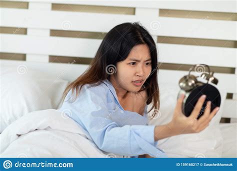 Young Asian Woman Shocked As She Waking Up Late In Morning Young Girl