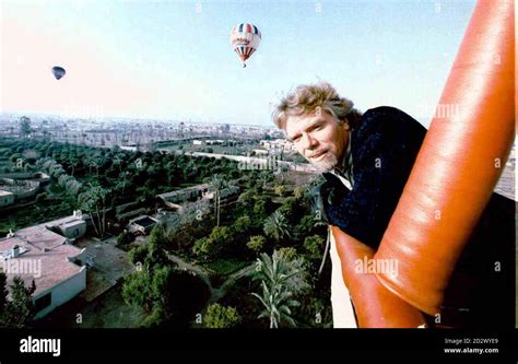 Richard Branson Aboard One Of The Virgin Balloon Fleet Floats Over The