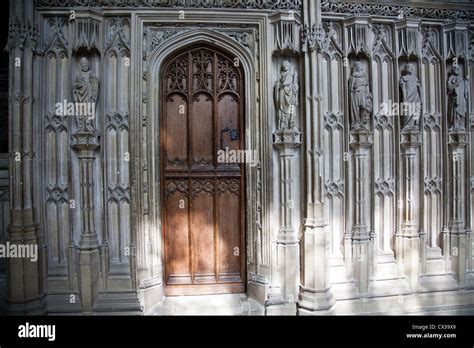 Winchester Cathedral Interior Architecture - wall carvings and door - Hampshire UK Stock Photo ...