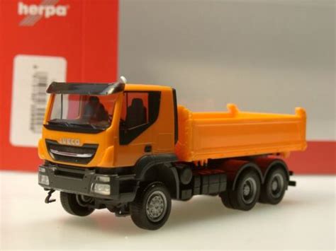 Herpa Iveco Trakker 6x6 Baukipper LKW Kommunal Orange 309998 1 87