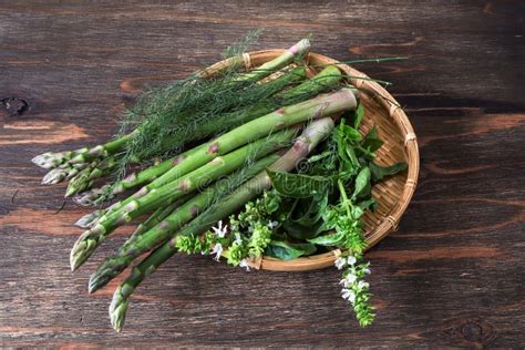 Asparagus and Basil on the Bamboo Colander Stock Photo - Image of ...