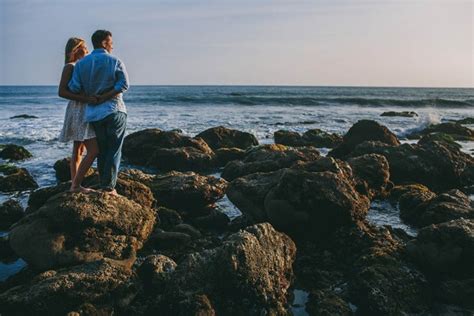 El Matador Beach Surfing Engagement | Junebug Weddings