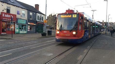 Sheffield Supertram Departs Hillsborough Park With A Yellow Route