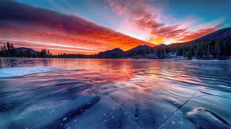 Frozen lake at sunset - backiee