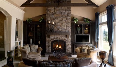 Traditional Living Room With Dark Wood Accents And Stone Fireplace