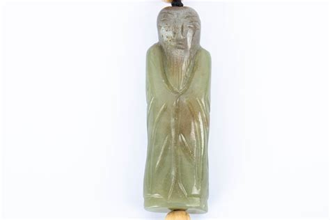 Bidlive Late Qing Jade Shouxing Pendant