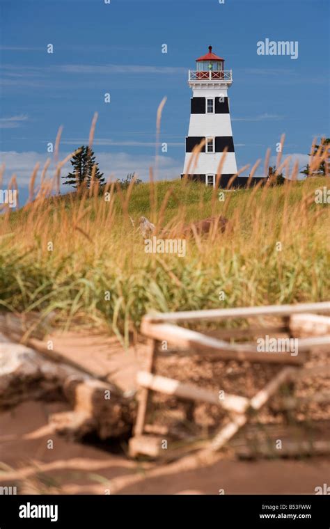 An Abandoned Lobster Trap Sits In Front Of The West Point Lighthouse On