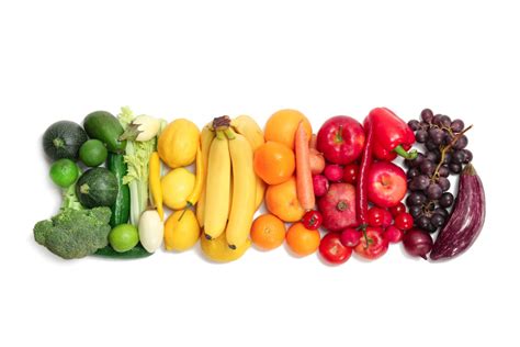 Rainbow Composition With Fresh Vegetables And Fruits On White