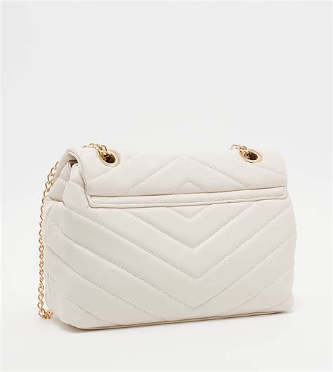 Buy Tyra Quilted Flap Crossbody Bag In Beige Thstreet Saudi Arabia