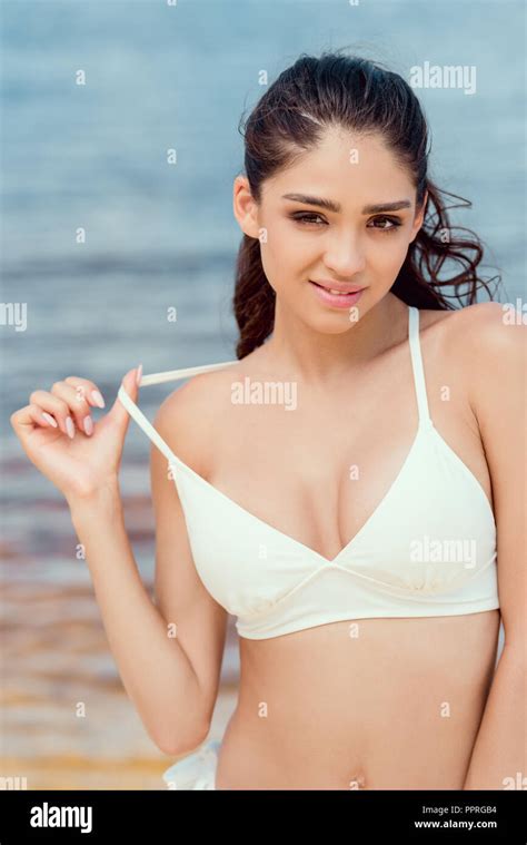 Beautiful Woman Posing In White Bikini On Beach At Sea Stock Photo Alamy